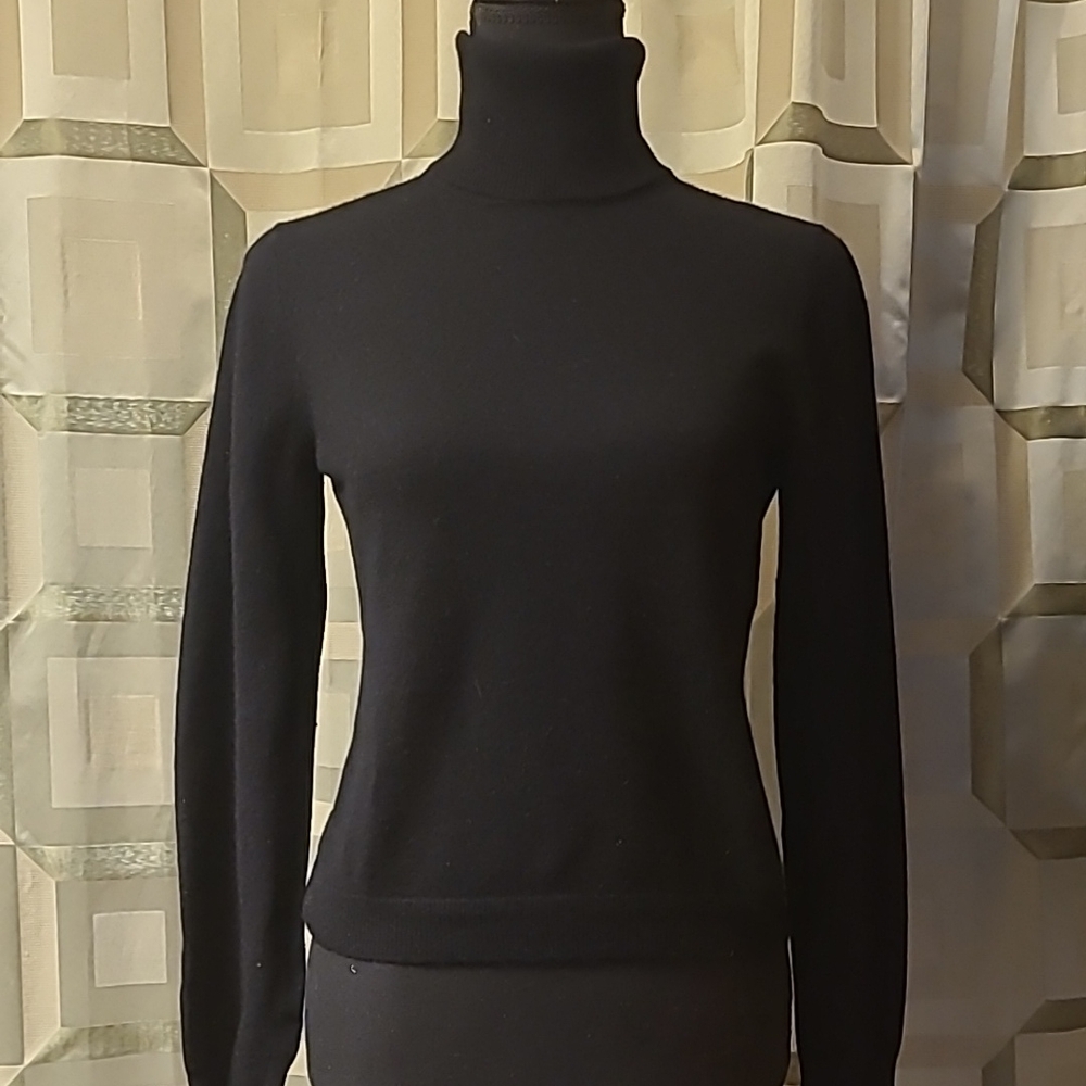 Black Turtleneck Sweater. 48% Cashmere. 52% Wool. Fits like S.